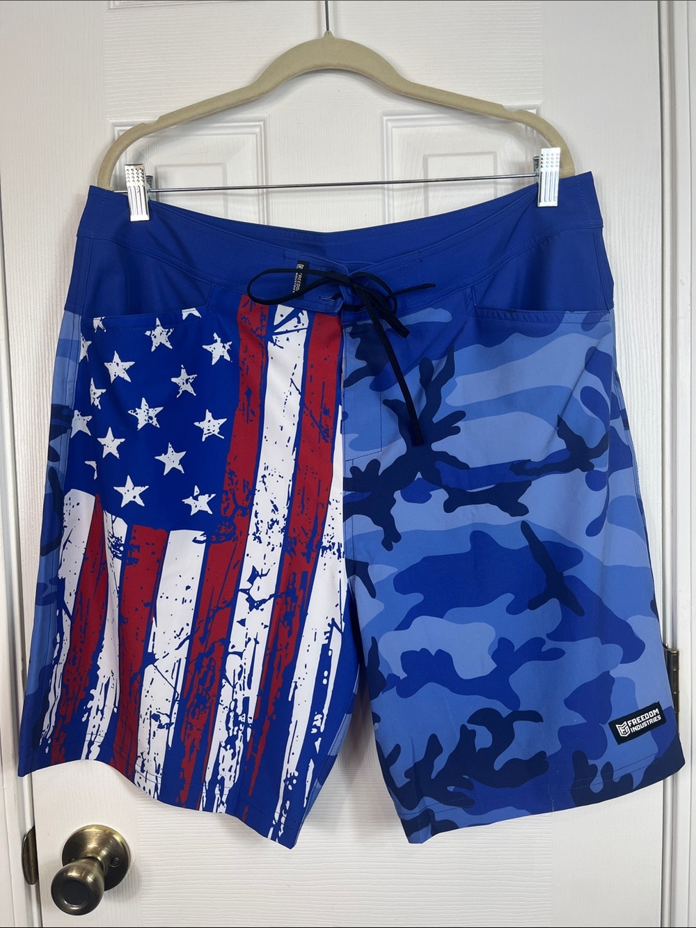 NWOT Freedom Industries red, white and blue mens swim trunks size XL. Pockets
